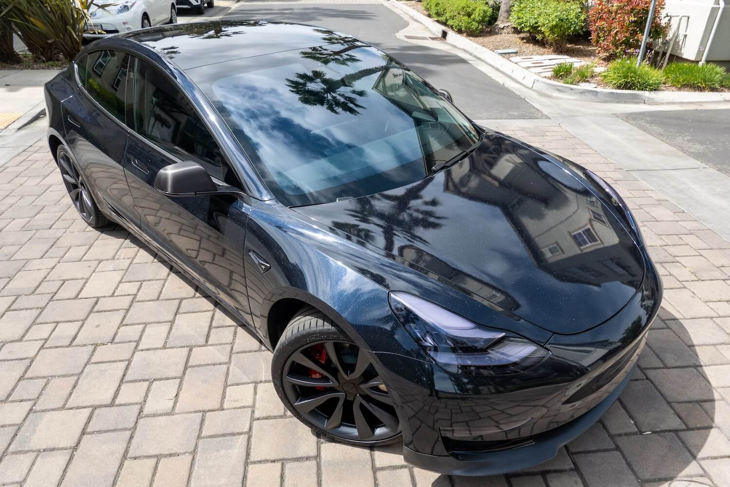 Tesla Model 3 wrapped in 3M 1080 Matte Deep Black vinyl